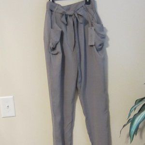 Jennifer Lopez - size med- gray- tapered 100% rayon pants